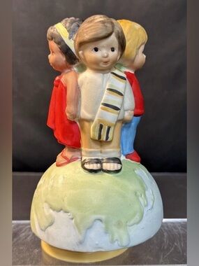 Vintage hand-painted collectible musical Figurine “We R the World”